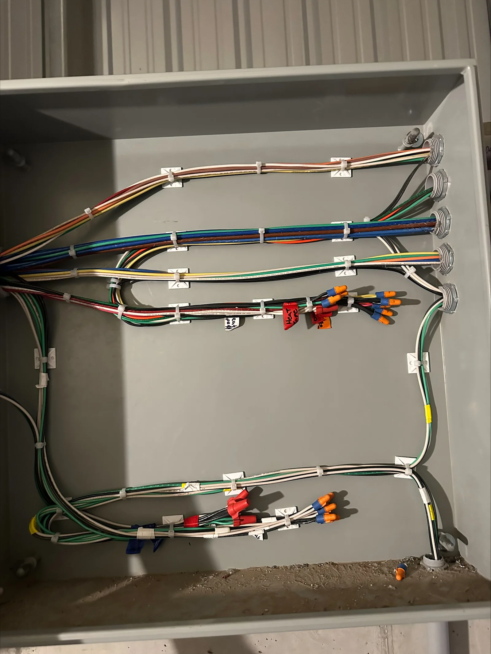 Control panel interior with organized multi-color wiring, terminal blocks, and cable management